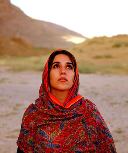 An Iranian woman considering ancient history